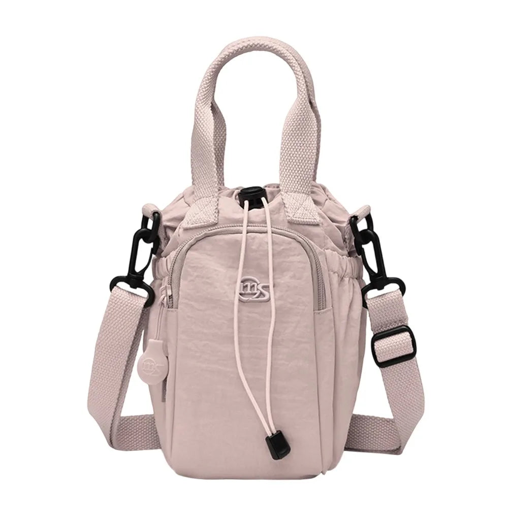 Sac Bandoulière Femme Grande Capacité pour Quotidien & Voyage – Imperméable avec Poche Téléphone et Porte-Bouteille