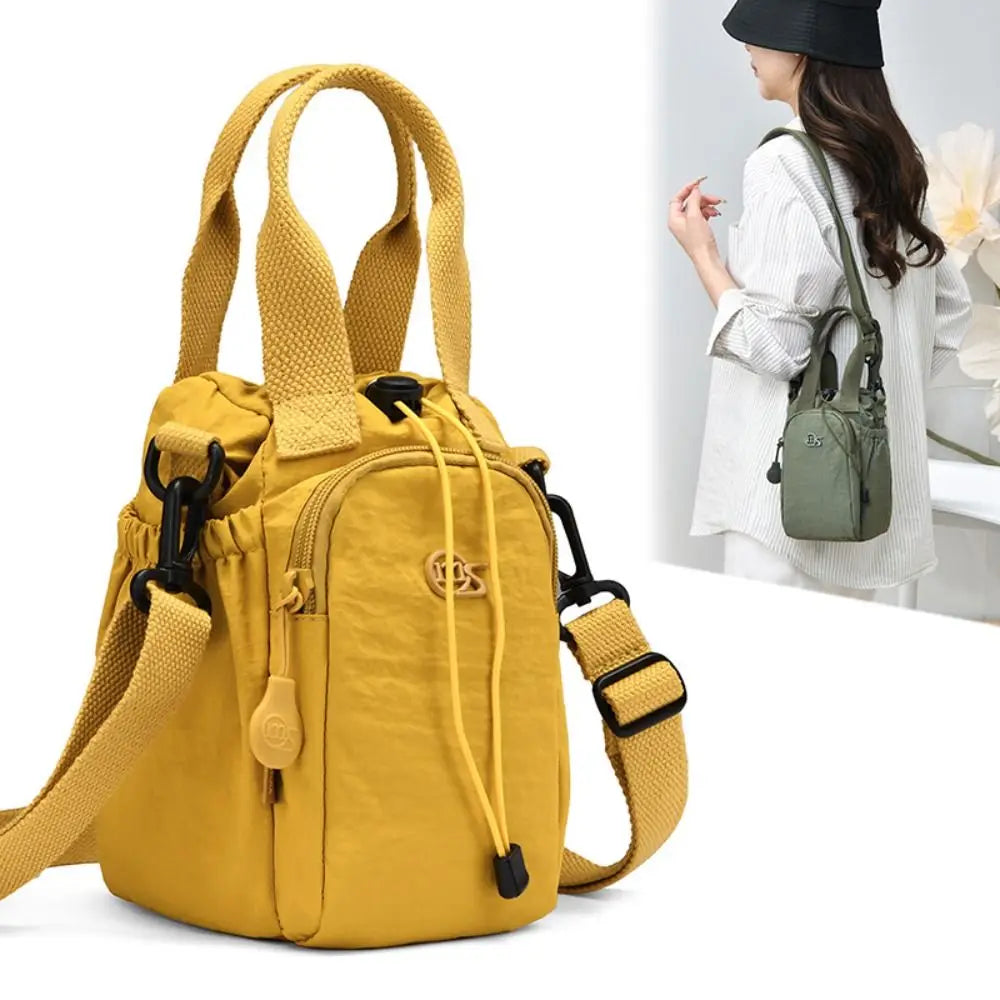 Sac Bandoulière Femme Grande Capacité pour Quotidien & Voyage – Imperméable avec Poche Téléphone et Porte-Bouteille