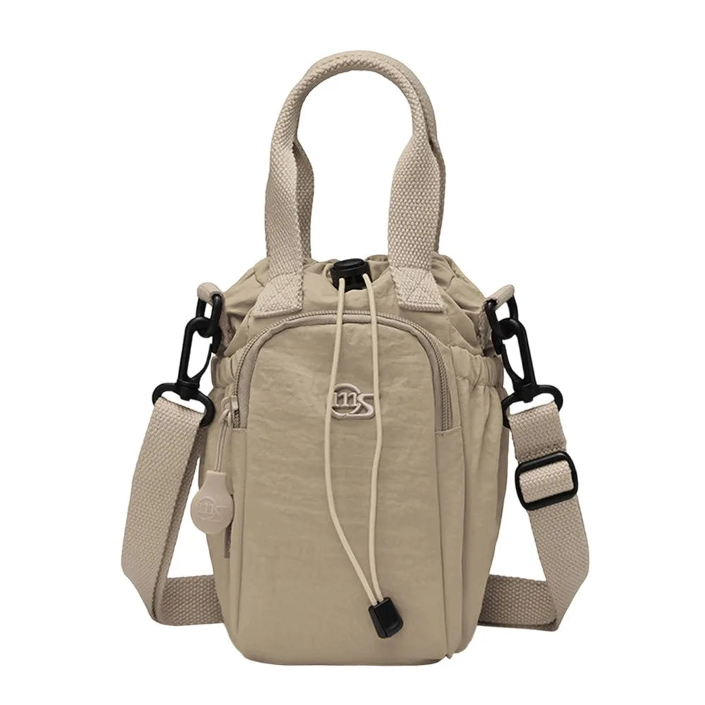 Sac Bandoulière Femme Grande Capacité pour Quotidien & Voyage – Imperméable avec Poche Téléphone et Porte-Bouteille